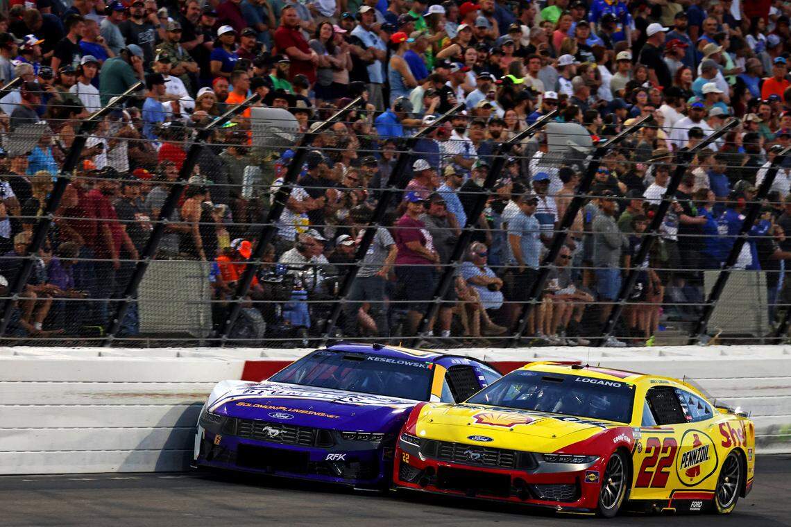 May 18, 2025; North Wilkesboro, North Carolina, USA; NASCAR Cup Series driver Brad Keselowski (6) and NASCAR Cup Series driver Joey Logano (22) during NASCAR All-Star Race at North Wilkesboro Speedway.
