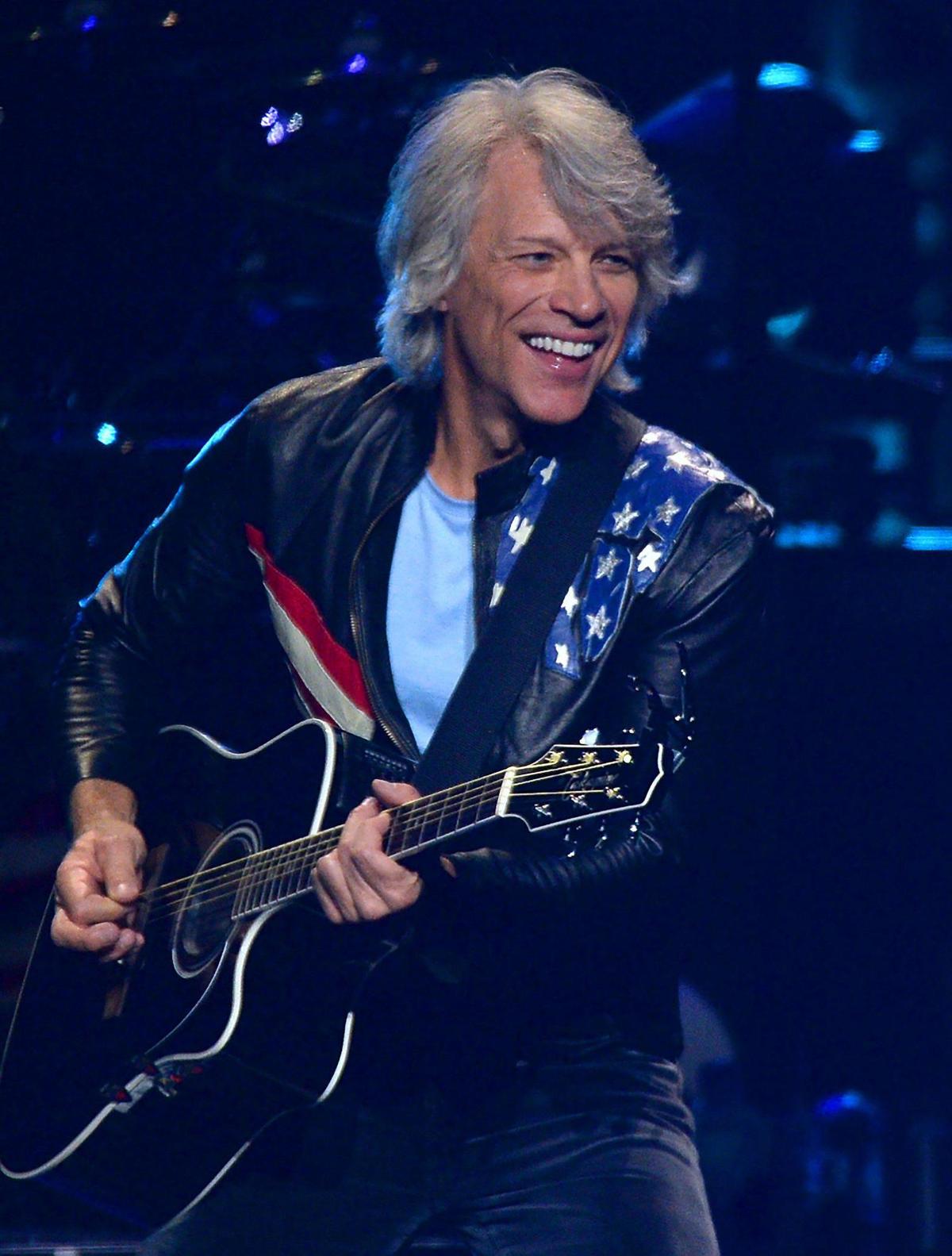 Jon Bon Jovi smiles at the fans as he and his bandmates perform during the Bon Jovi 2022 Tour at Spectrum Center in Charlotte, NC on Friday, April 8, 2022.