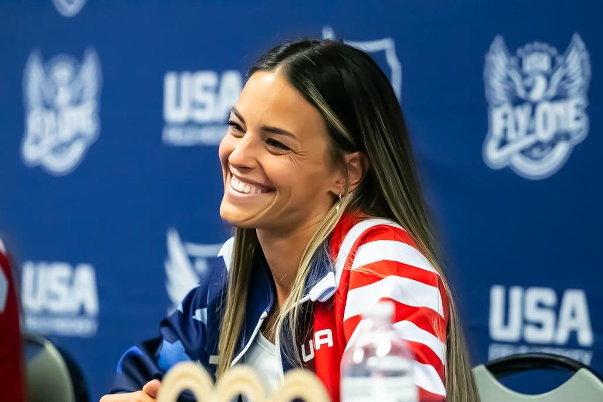 Amanda Golini shares smiles and stories for the press at the Providence Day Pep rally for the USA Field Hockey sendoff to the Olympics in Paris