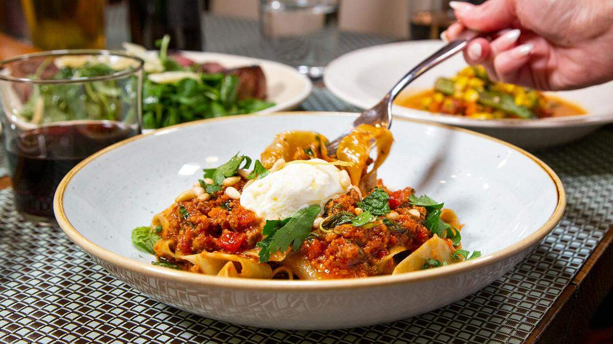 Aria's new winter menu includes handmade Pappardelle with venison Bolognese, Uno Alla Volta fresh ricotta, caramelized fennel, pancetta and pickled turnips.