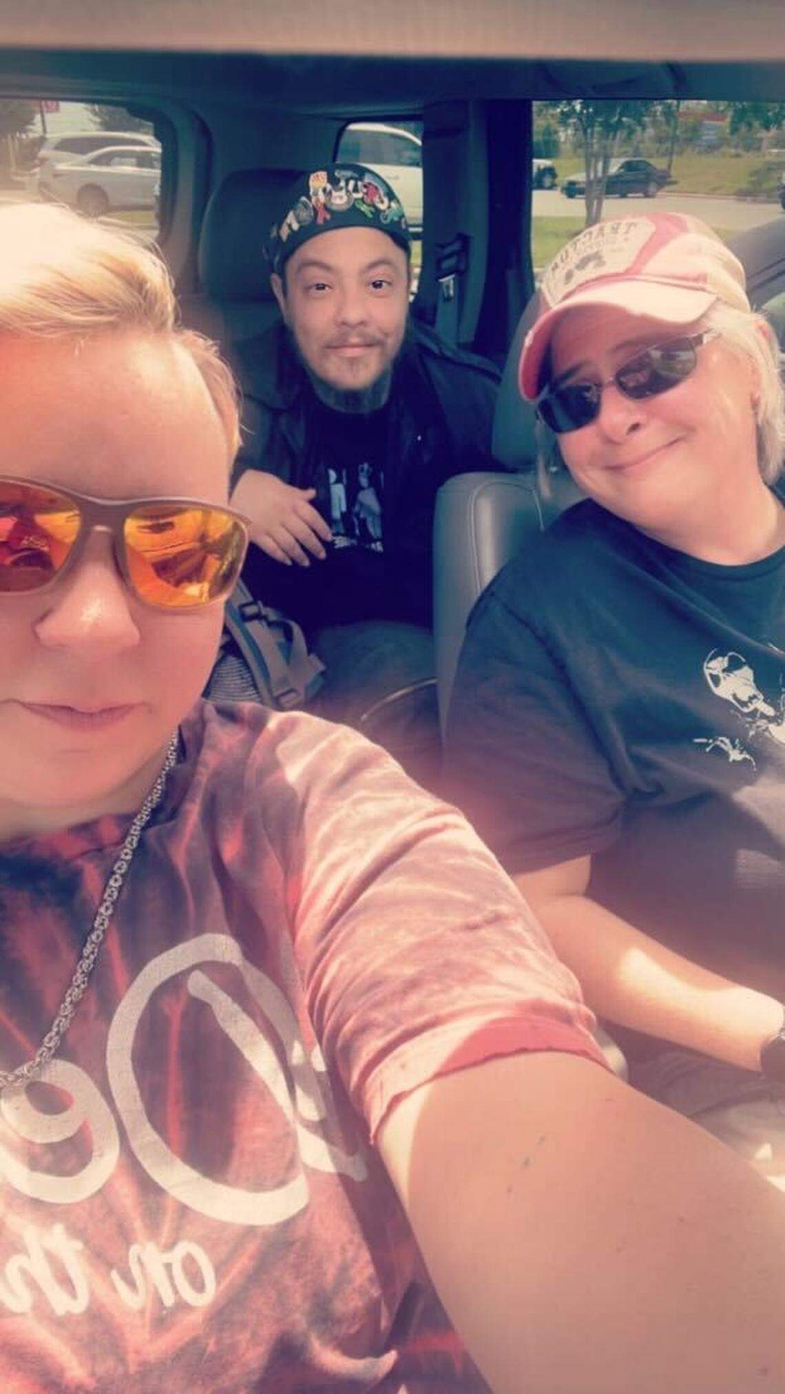 Liam Johns, center, is shown with friends April Jeadon, left, and Kat Kennedy, right. Johns passed away on Sept. 14.