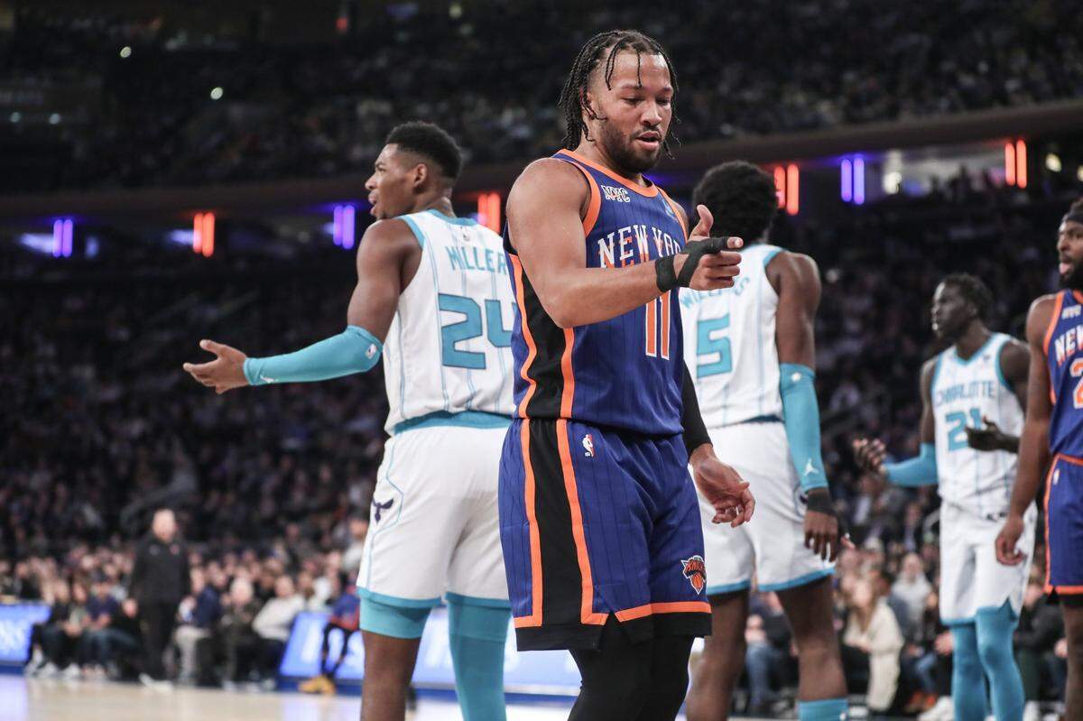 New York Knicks guard Jalen Brunson (11) celebrates after scoring in the first quarter against the Charlotte Hornets at Madison Square Garden.