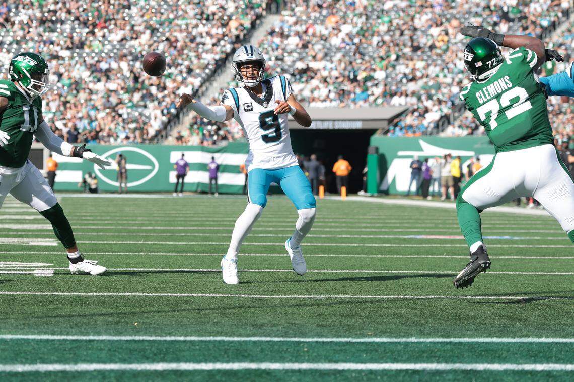 Carolina Panthers quarterback Bryce Young (9) throws the ball for a touchdown in the second quarter against the New York Jets on Sunday in New Jersey.