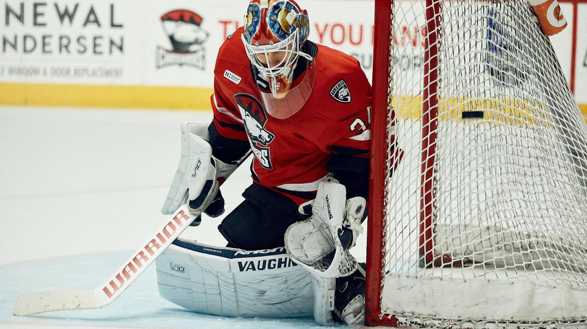 Goaltender Kaapo Kahkonen saves a ricochet shot against the Laval Rockets in Sunday’s first period. The Charlotte Checkers defeated the Laval Rocket, 5-1.