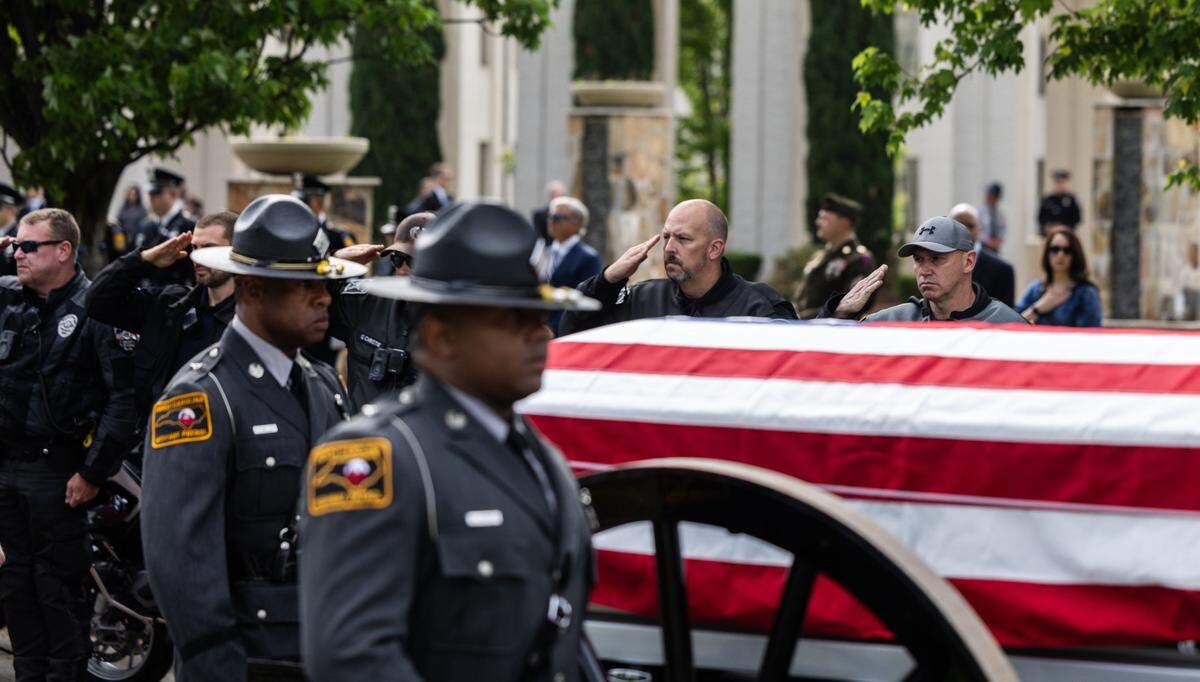 The funeral procession for CMPD Officer Joshua Eyer in Charlotte on Friday.