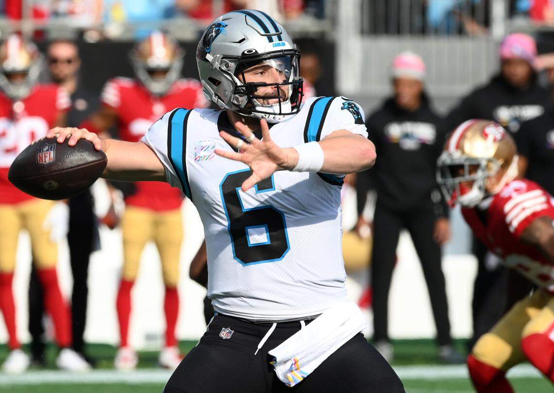 Carolina Panthers quarterback Baker Mayfield drops back to pass for Carolina in 2022. Mayfield’s stint in Charlotte was so unsuccessful that the Panthers released him, but he now is a legitimate MVP candidate for the Tampa Bay Buccaneers.