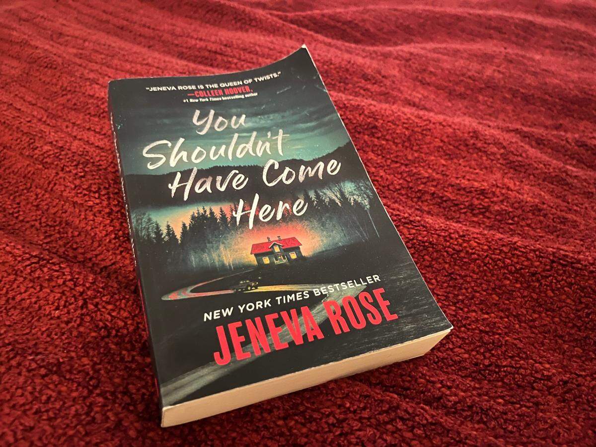 A copy of “You Shouldn’t Have Come Here” by Jeneva Rose.