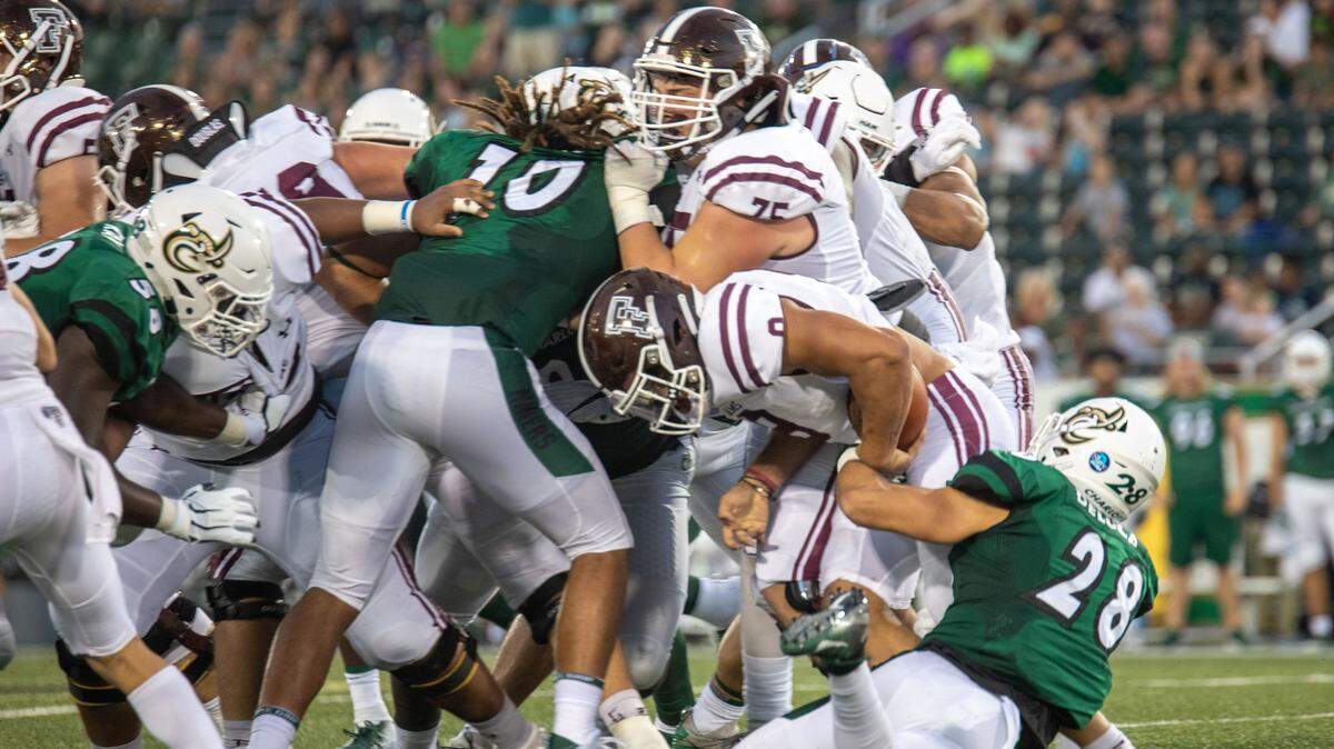 Safety Ben Deluca (28) and defensive end Tyriq Harris (10) are among Charlotte 49ers seniors who could potentially play again in 2021.