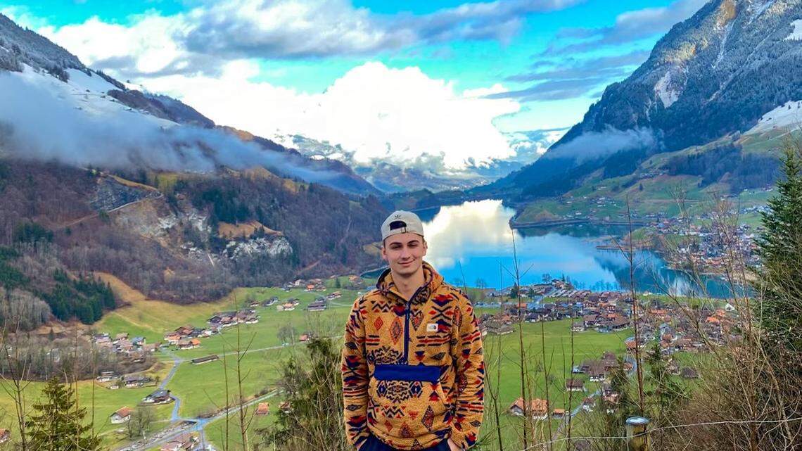 TikToker Zachary Keesee in front of Lake Lungern during a trip to Switzerland in January 2020.