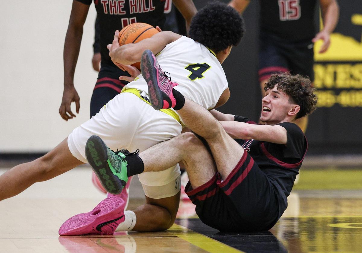 Bunker Hill’s Aidan Cox, right, vies with Lincolnton’s LJ Smith for possession of the ball during the game in Lincolnton, NC on Friday, January 24, 2025.