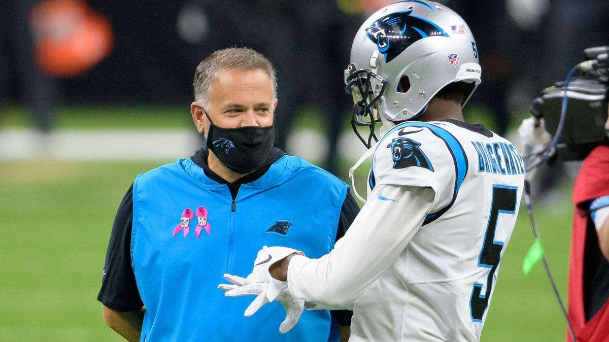 Carolina Panthers head coach Matt Rhule talks with Carolina Panthers quarterback Will Grier (7) at the Mercedes-Benz Superdome on Sunday, October 25, 2020, in New Orleans.