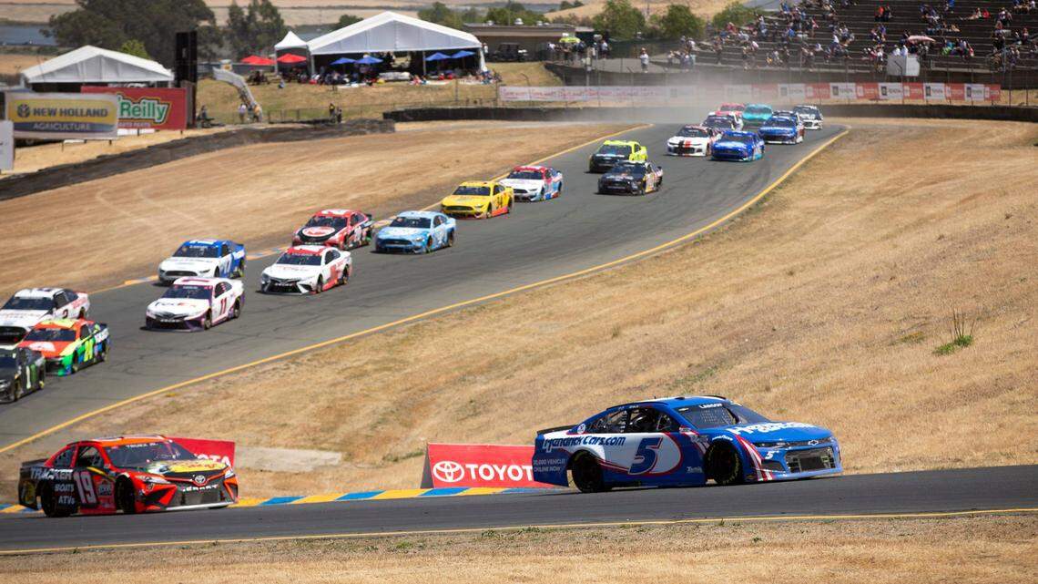 Kyle Larson (5) leads the field during a NASCAR Cup Series race, Sunday, June 6, 2021, at Sonoma Raceway in Sonoma, Calif. (AP Photo/D. Ross Cameron)