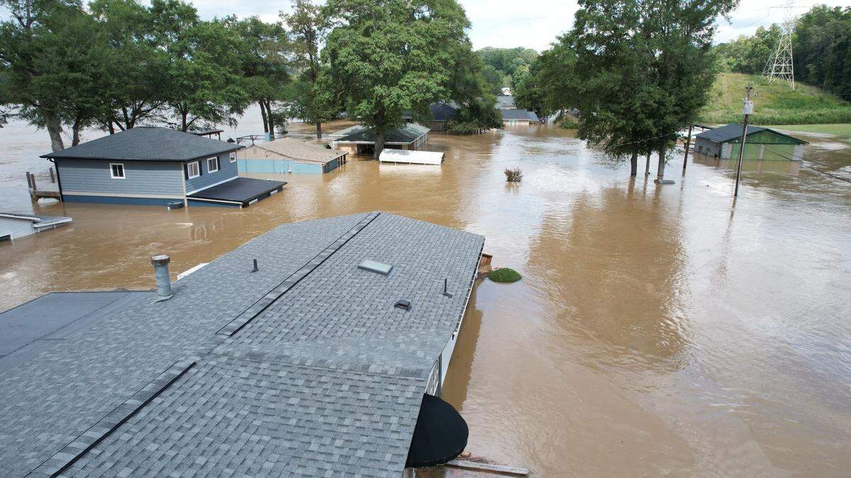 This image taken by a drone shows homes along the Catawba River submerged in floodwater from Helene. A number of homes saw roof-high flooding as water moved through the Catawba River system. Mark Thompson DroneFootage.Pro