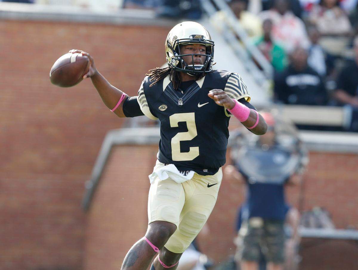 Wake Forest quarterback Kendall Hinton (2) looks to pass during the second half of N.C. State’s 35-17 victory over Wake Forest at BB&T Field in Winston-Salem, N.C., Saturday, Oct. 24, 2015.