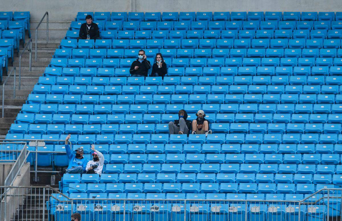 Carolina Panthers fans take their socially distanced seats prior to the team playing the Arizona Cardinals at Bank of America Stadium in Charlotte, NC on Sunday, October 4, 2020.