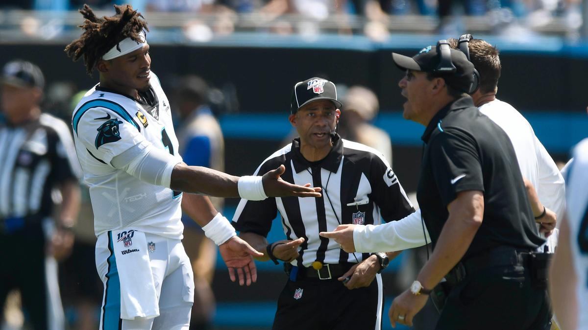 Carolina Panthers coach Ron Rivera (right) said Tuesday he won’t pressure quarterback Cam Newton (1) to rush back from injury amid reports that Newton would be able to practice after the team’s bye week.