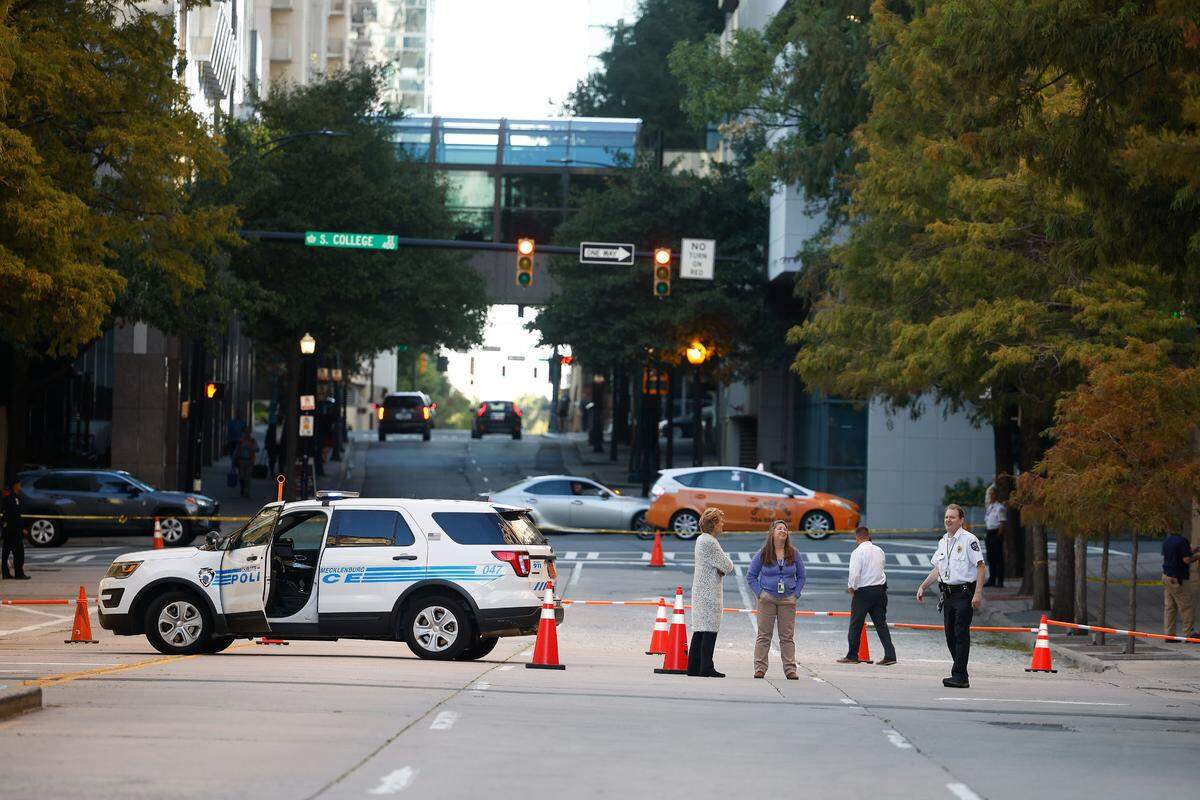 A bullet shatters 16th-floor window of Wells Fargo building uptown Charlotte on Tuesday, CMPD says. MLK was blocked off