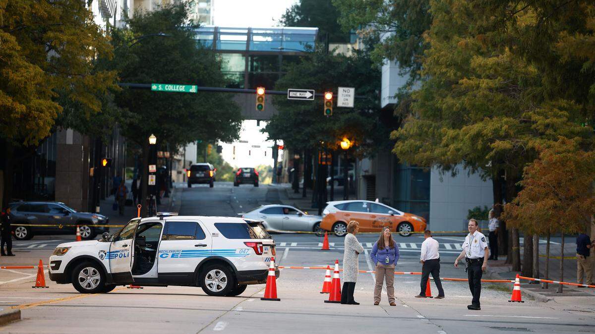A bullet shatters 16th-floor window of Wells Fargo building uptown Charlotte on Tuesday, CMPD says. MLK was blocked off