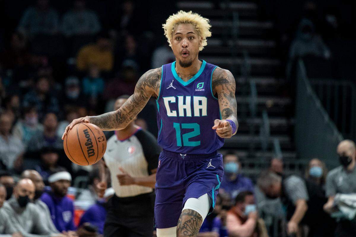 Charlotte Hornets guard Kelly Oubre Jr. (12) brings the ball upcourt during the first half of an NBA basketball game against the Sacramento Kings Friday. Oubre had 22 points in Charlotte’s 124-123 win.