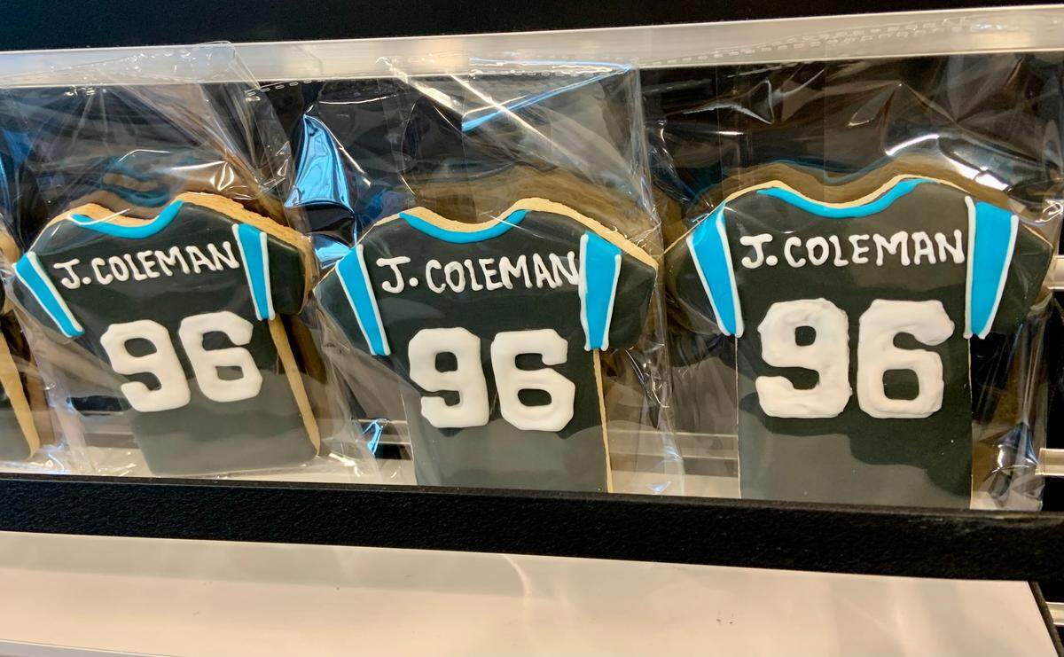 Cookies honoring longtime Carolina Panthers team employee John Coleman were part of a reception honoring Coleman on Saturday, Dec. 11, 2021. The “96” refers to 1996, the year Coleman - who by that time had already had careers in the U.S. Army and as a probation officer - came to work for the Panthers.