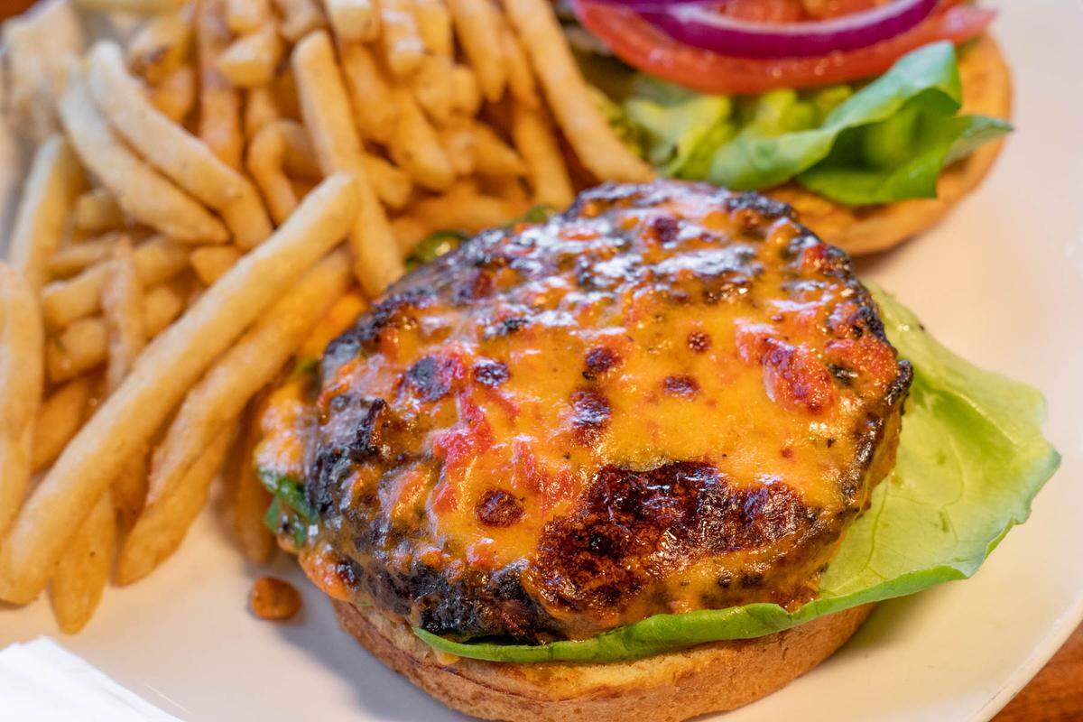 Harper’s Classic Angus Burger has Betty’s pimento cheese, mayo, mustard, lettuce, tomato, relish and red onions with a choice of side.