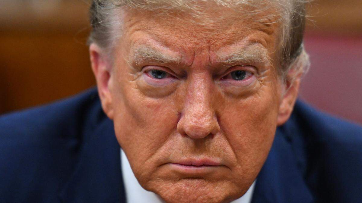 Former President Donald Trump attends the first day of his trial on Monday, April 15, 2024 in Manhattan Criminal Court in New York City. He is accused of covering up hush money payments linked to extramarital affairs.