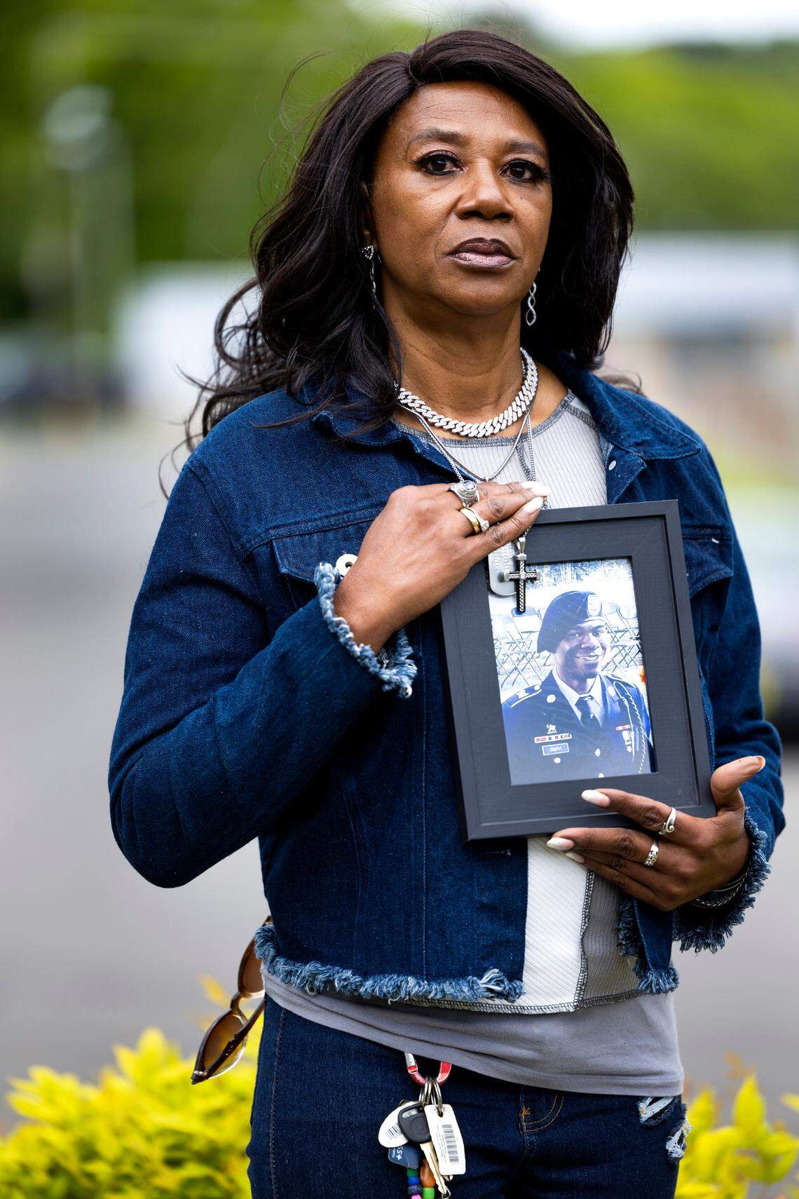 Valerie Smith-Ragland poses with a photo of her son, Makari Jamel Smith, in Oxford, N.C.