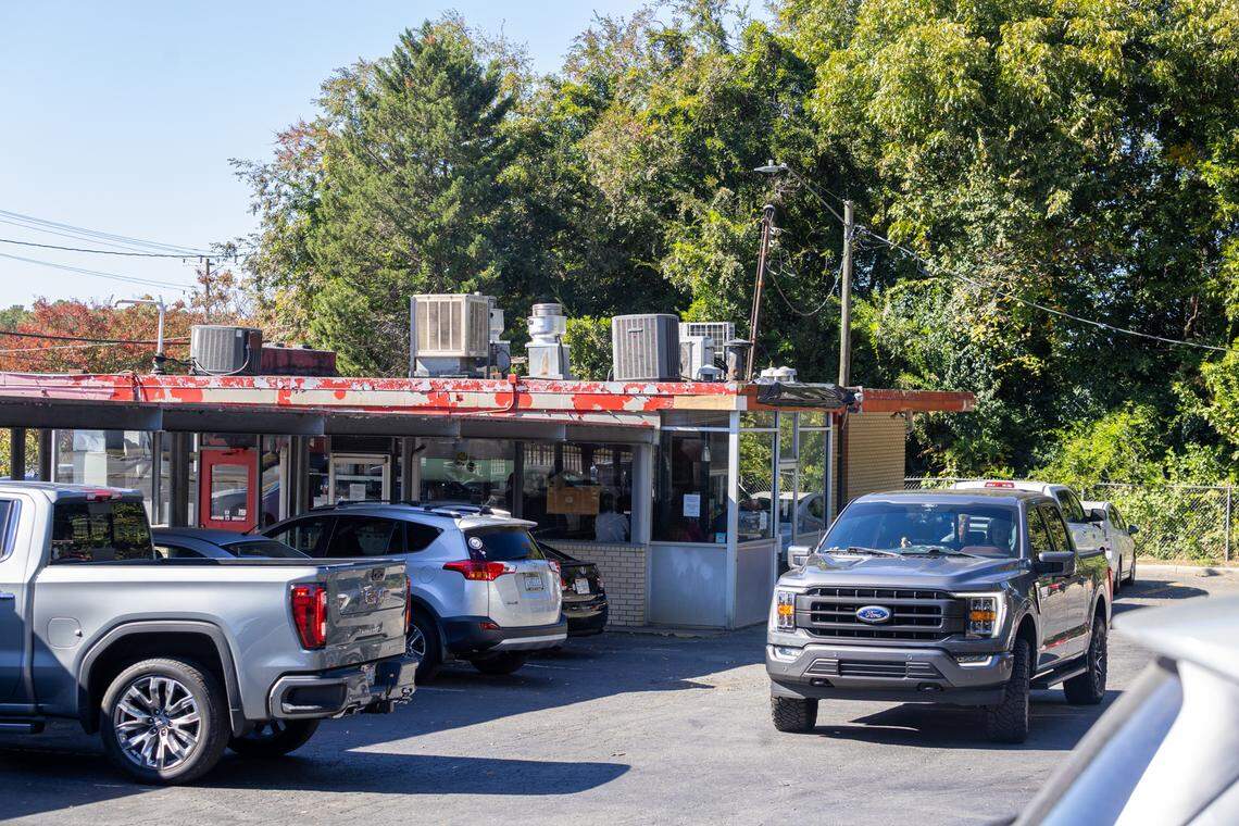 Cars pull up to the stalls to order at Bar-B-Q King on Wilkinson Boulevard in Charlotte.