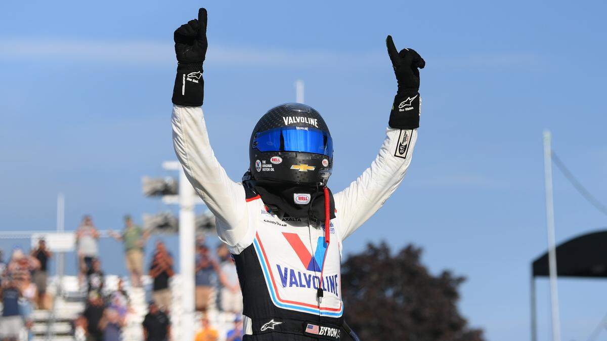 Aug 20, 2023; Watkins Glen, New York, USA; NASCAR Cup Series driver William Byron (24) celebrates his victory in the Go Bowling at The Glen at Watkins Glen International. Mandatory Credit: Rich Barnes-USA TODAY Sports