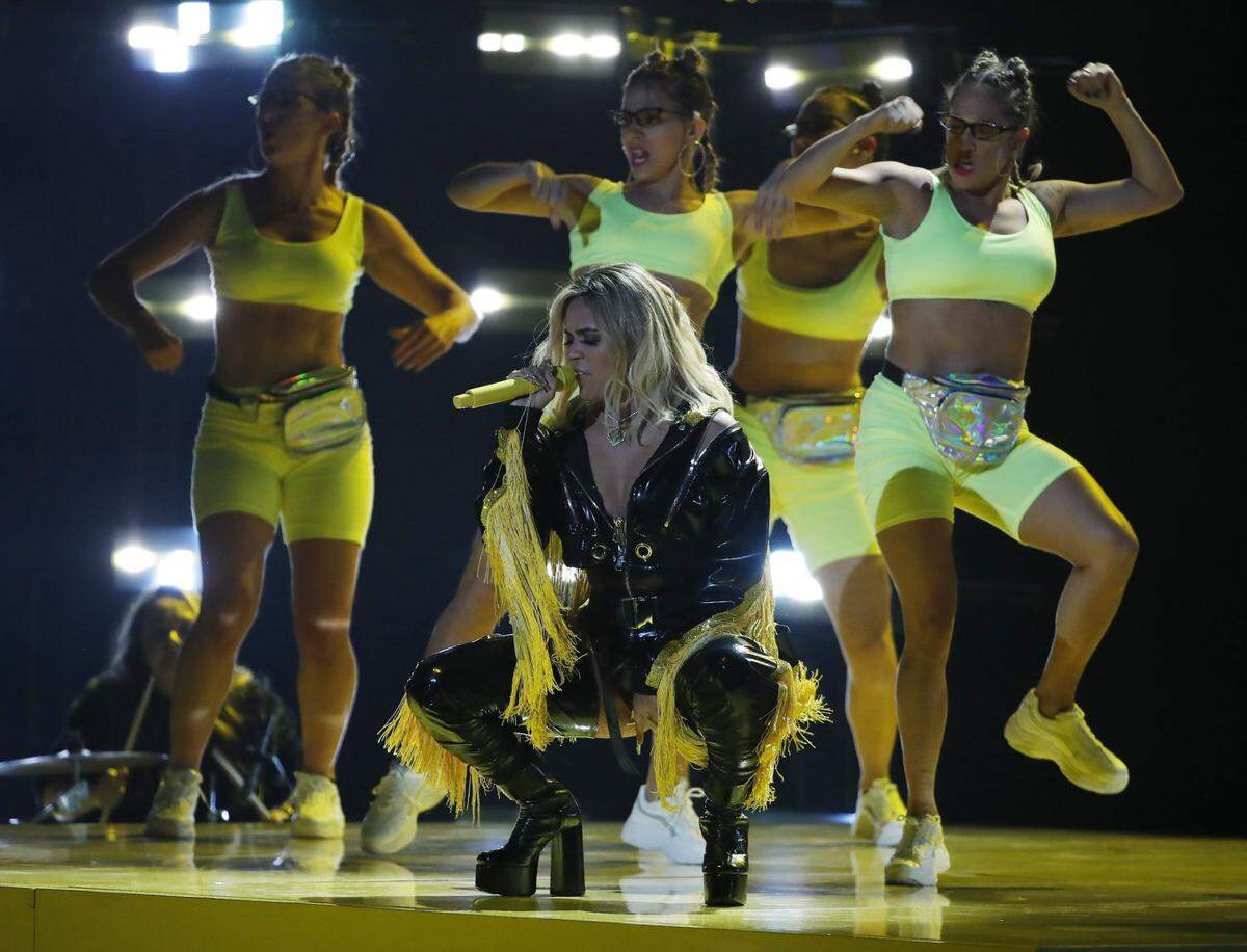 Karol G leads a mini-parade of Latin-music stars coming to Spectrum Center this fall.
