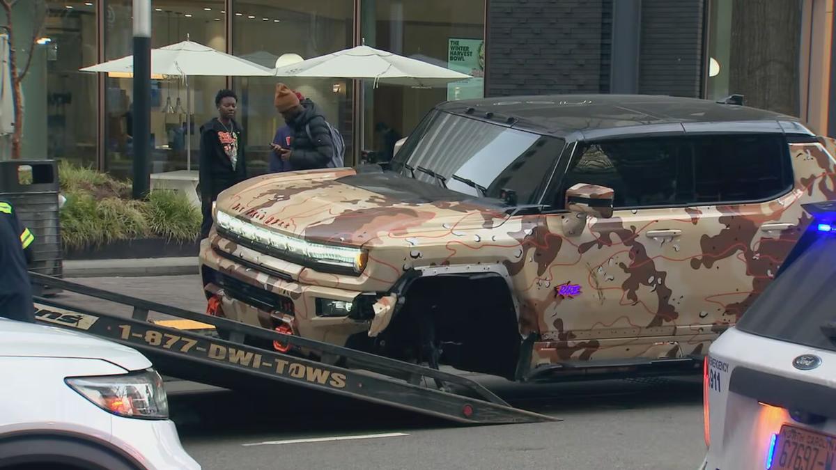 This image captured by WSOC-TV shows one of Hornets star LaMelo Ball’s car’s being towed after getting in a crash in uptown Charlotte.