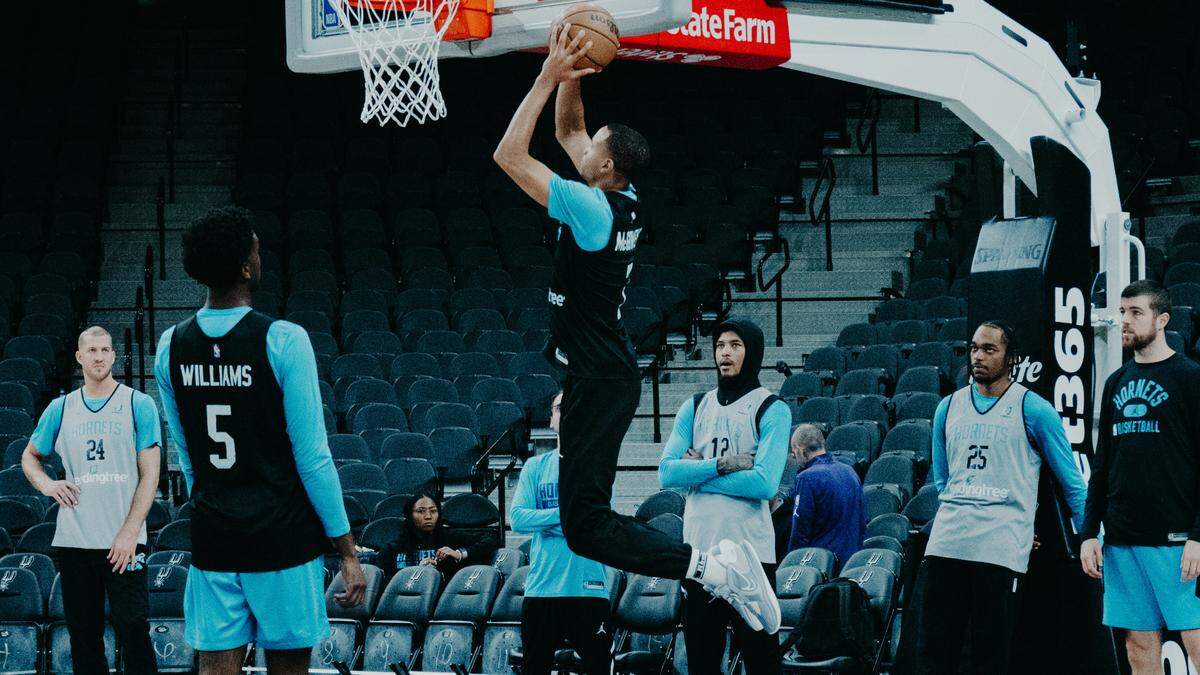 Charlotte Hornets rookie Bryce McGowens goes up for a layup during the team’s morning shootaround at the AT&T Center in San Antonio in preparation for Wednesday night’s season opener.