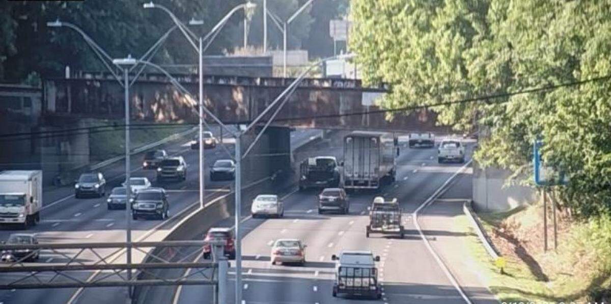 Traffics moves along somewhat smoothly on Interstate 77 just south of Woodlawn Road in this image taken just after 9 a.m. on September 19, 2022. Downed power lines had closed a stretch of the highway.
