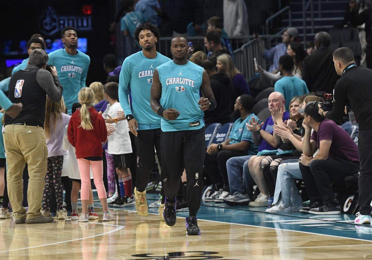 Charlotte Hornets guard Terry Rozier (3) enters the arena before the game against the Minnesota Timberwolves at the Spectrum Center.
