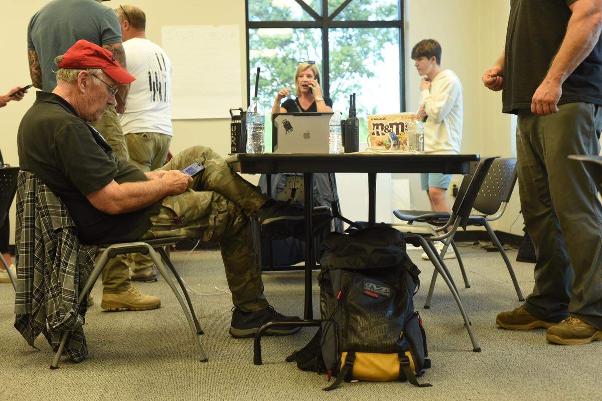 Volunteers with the nonprofit Operation Airdrop work at the Hickory Regional Airport on Monday, Sept. 30, 2024, to find and deliver supplies to people cut off by Helene’s flooding.
