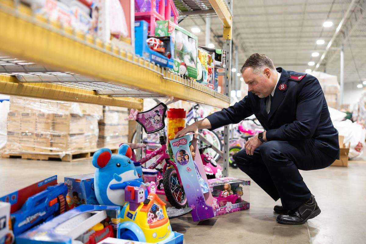 Major Jason Burns of The Salvation Army organizes toys for The Salvation Army of Greater Charlotte’s annual Angel Tree program in Charlotte, N.C., on Thursday, November 14, 2024.