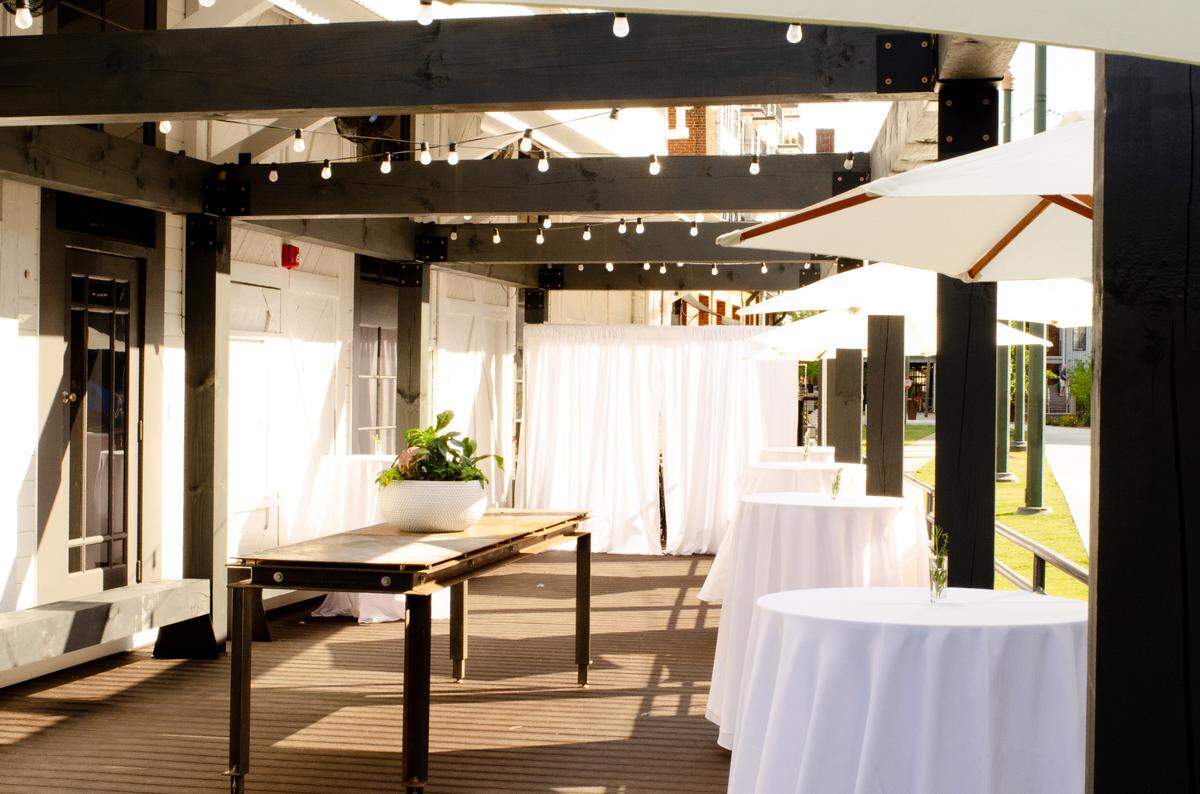 The outdoor patio at BOCADO Bar + Diner includes a covered pergola, fans and fire pits for year-round use.