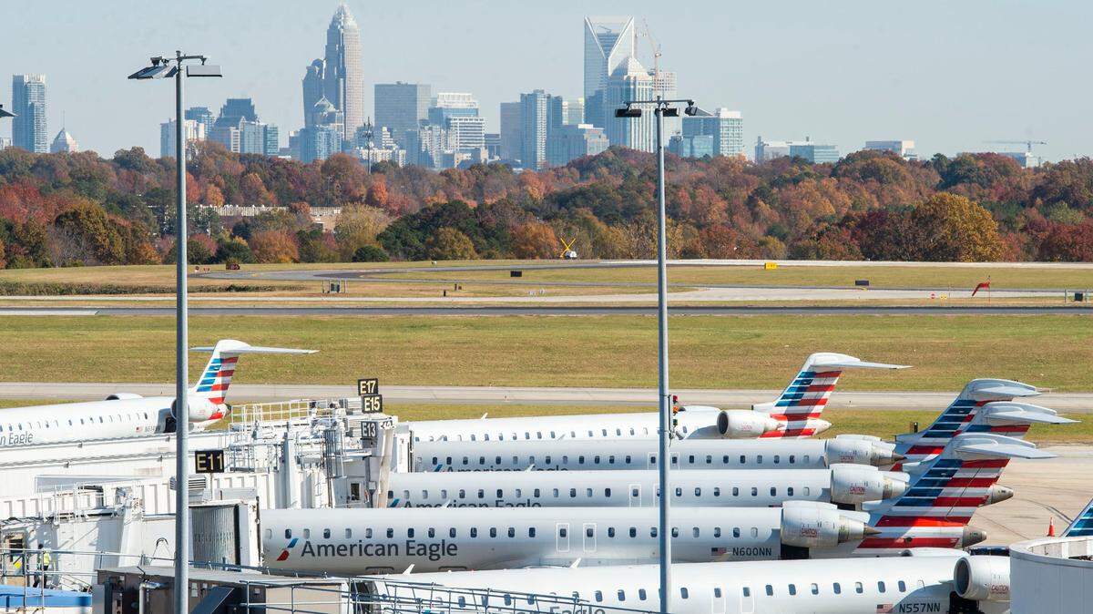 American Airlines planes sit at terminals at Charlotte Douglas International Airport on Tuesday, November 16, 2021 in Charlotte, NC.