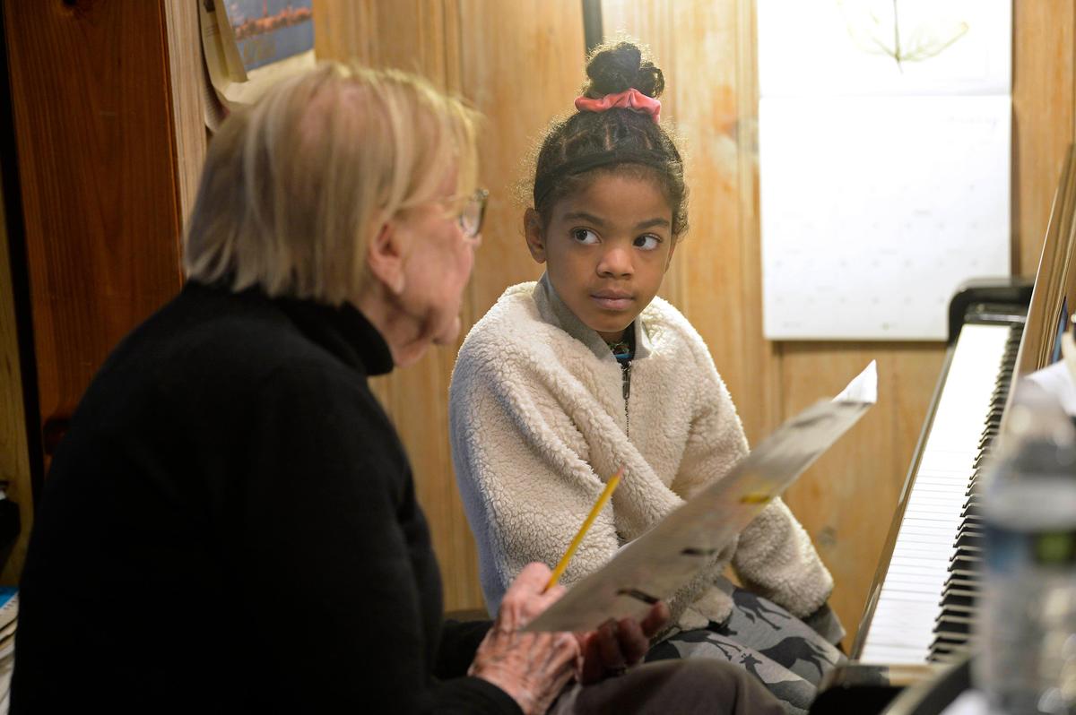 Dzidra Reimanis, a 92-year-old piano teachers, conducts a lesson with Kendall McKnight, 6, in Reimanis’ home. Reimanis has been teaching piano in Charlotte for more than 60 years.