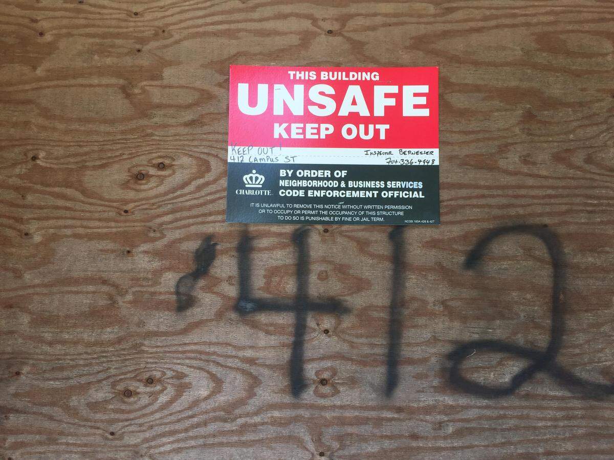 Warning sign on the door of Mt. Carmel Baptist Church.