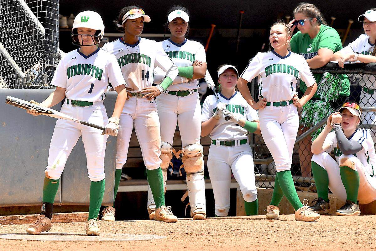 The Weddington Warriors look on in the final moments of the game against Garner in the 4A Championship series. The Garner Trojans and the Weddington Warriors met in the NCHSAA 4A Softball Championship Series in Greensboro, N.C. on June 1, 2024.