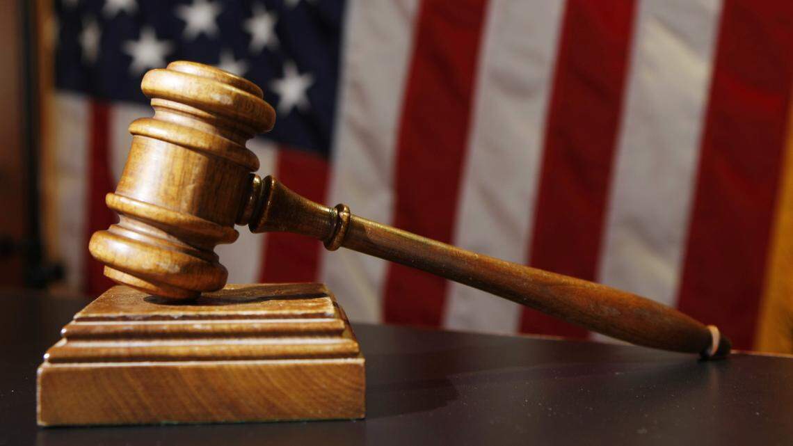 An Austin, Texas, businessman is accused of hiring men to kill a man and woman who were trying to blackmail him, federal officials said.