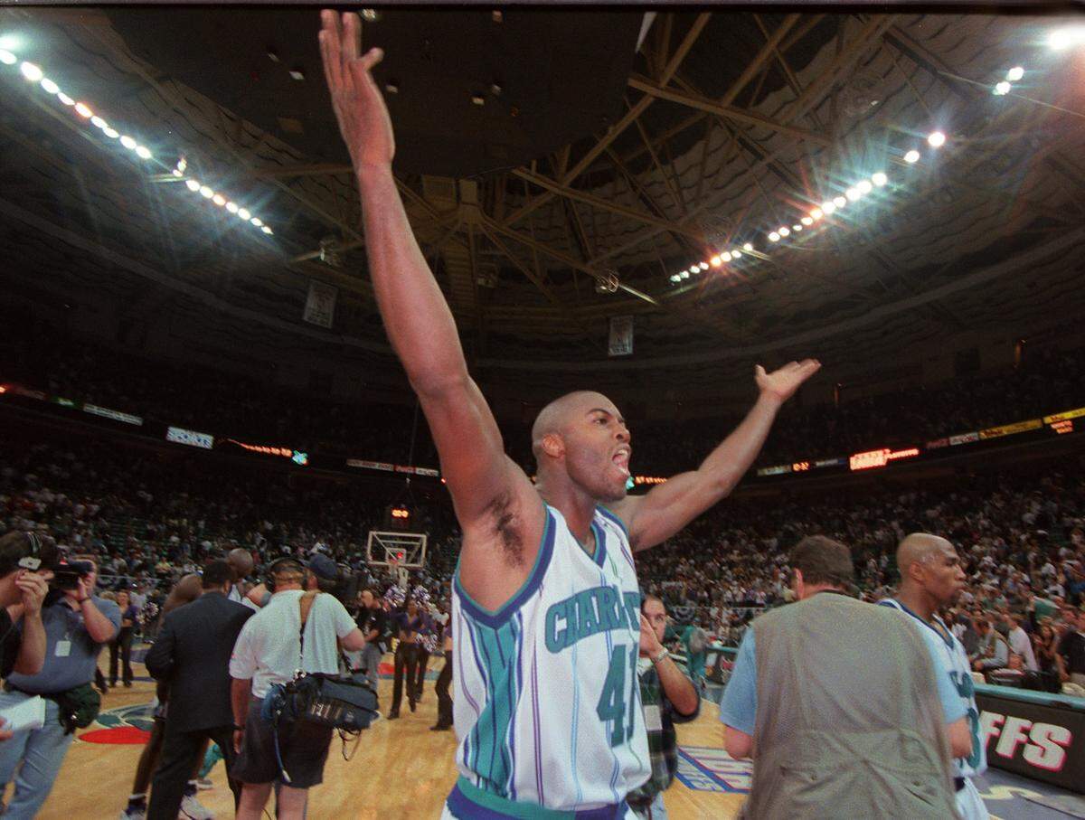 Glen Rice celebrates the team’s win in Game 2 against the Atlanta Hawks i,k their 1998 NBA playoff series. The win put the Hornets up 2-0.