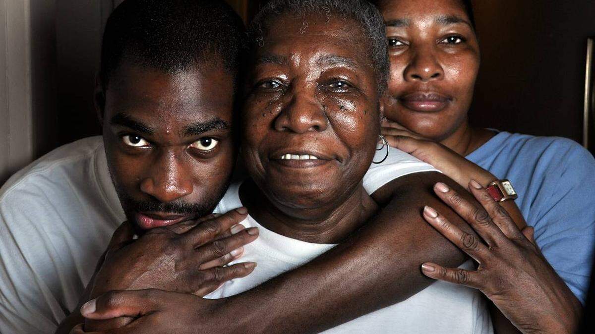 In this 2010 photo, Danquirs Franklin, 18 at the time, poses for a family portrait with his grandmother, Mary Boyd (center), and his mother, Deborah Franklin.