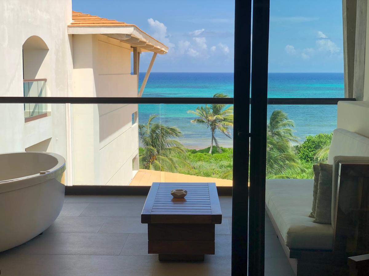 Travel writer DeAnna Taylor works remotely and spent most of three days using an oceanview balcony in Mexico as her office space during COVID-19.