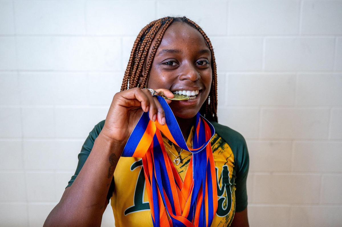 Female athlete of the year Maya Love poses for a portrait at Independence High School in Charlotte, NC Wednesday, June 11, 2025. Love, a recent graduate of Independence High School, has been recognized as a top athlete in track and is set to continue her track career at the University of South Carolina.