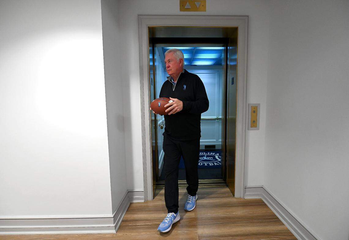 UNC head football coach Mack Brown steps out of an elevator on the way to his office in Chapel Hill. Of retirement, Brown said: “Since I’m not going to think about it at all, there will be a day that I’ll get up and just say, ‘I think it’s best right now for North Carolina to transition to this.’ And then I’ll do it.”
