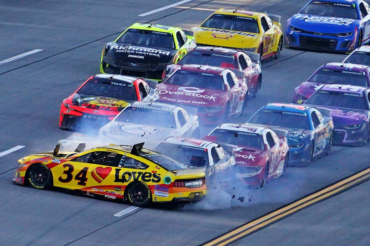 Apr 21, 2024; Talladega, Alabama, USA; NASCAR Cup Series driver Michael McDowell (34) wrecks on the last lap during the GEICO 500 at Talladega Superspeedway.
