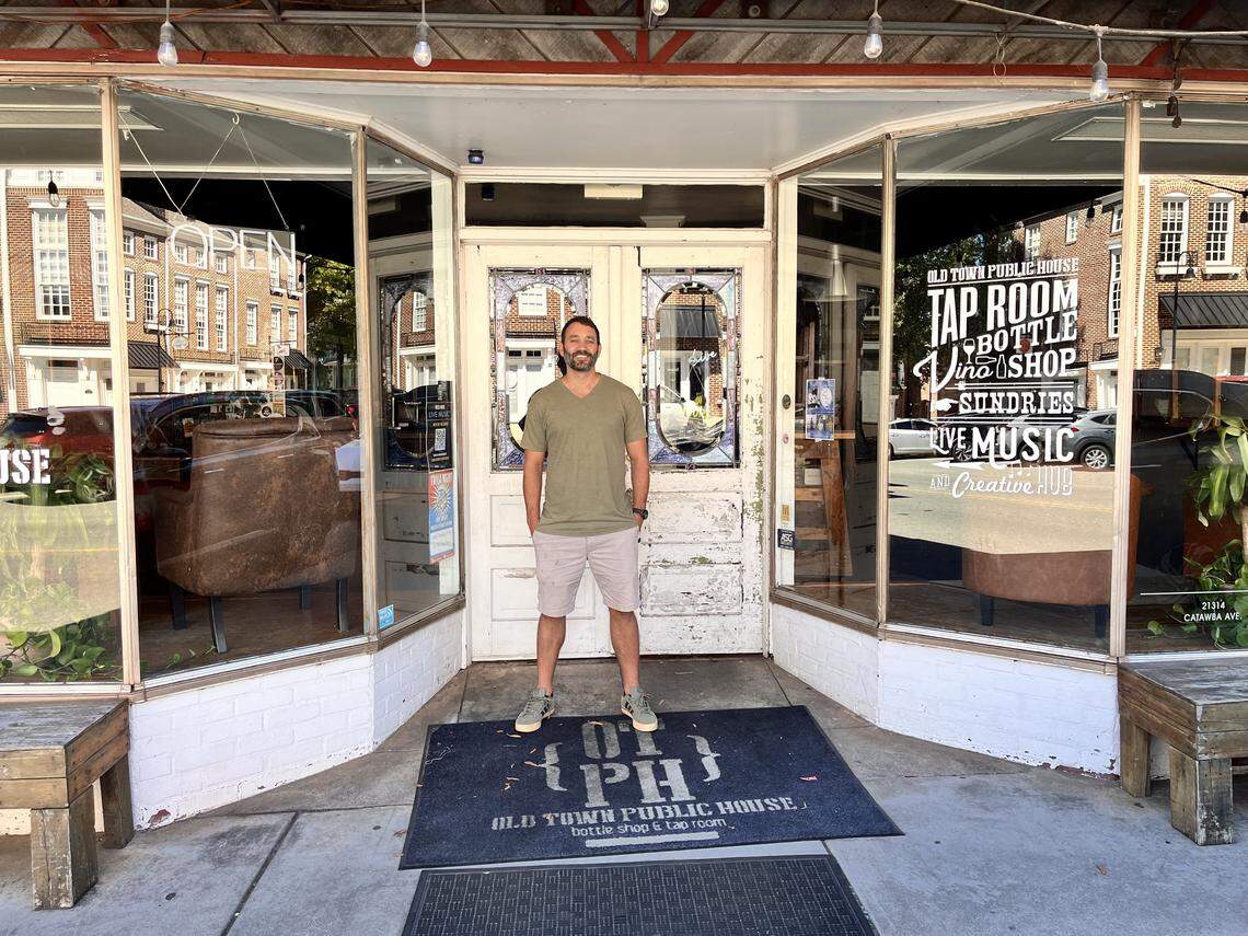 Owner Case Warnemunde poses outside Old Town Public House in downtown Cornelius on Thursday, Oct. 2, 2025.