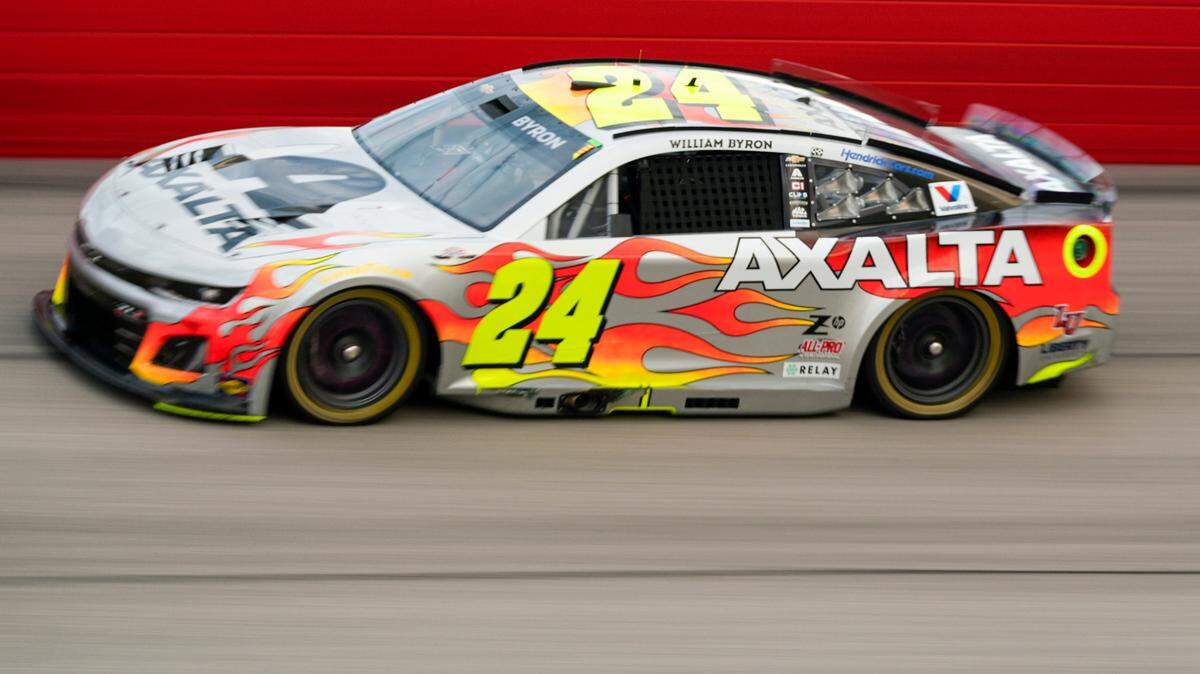 Apr 6, 2025; Darlington, South Carolina, USA; NASCAR Cup Series driver William Byron (24) drives into turn two during the Goodyear 400 at Darlington Raceway.